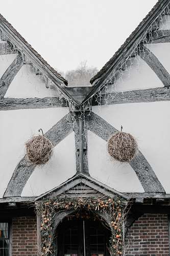 united kingdom white and brown concrete house crucifix